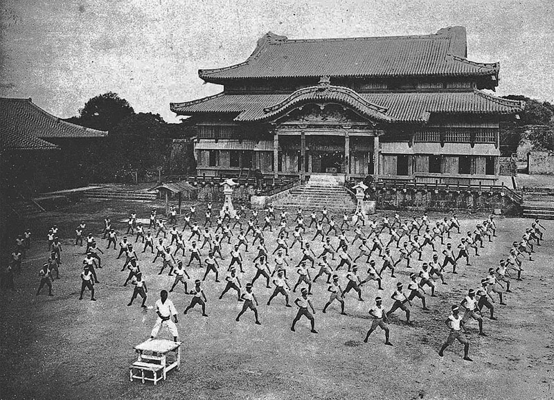 Karate training with Shinpan Gusukuma sensei at Shuri Castle c.1938, Okinawa Prefecture, Japan - Get the best karate uniforms in United States with Arawaza